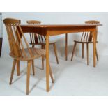 A VINTAGE RETRO 20TH CENTURY ELM EXTENDIBLE DINING TABLE AND THREE CHAIRS