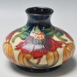 A 2003 MOORCROFT VASE WITH ANNA LILY PATTERN