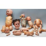 A GROUP OF 20TH CENTURY ANTIQUE GERMAN DOLLS AND DOOLS PARTS WITH PORCELAIN HEADS