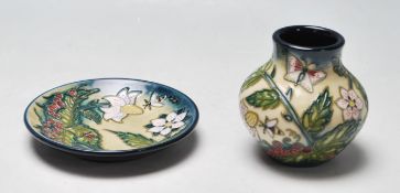 TWO MOORCROFT CERAMIC WARE TO INCLUDE A VASE AND A PIN DISH WITH MATCHING DECORATION