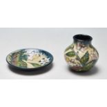 TWO MOORCROFT CERAMIC WARE TO INCLUDE A VASE AND A PIN DISH WITH MATCHING DECORATION