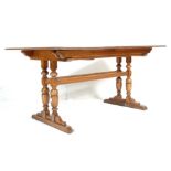 ERCOL LARGE DORCHESTER PATTERN ELM DINING TABLE