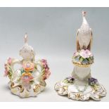 TWO ROYAL CROWN DERBY PORCELAIN CERAMIC FIGURINES OF A PEACOCK