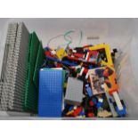 A LARGE QUANTITY OF LEGO BRICKS AND ACCESSORIES TOGETHER WITH 12 LARGE ROAD BASE PLATES