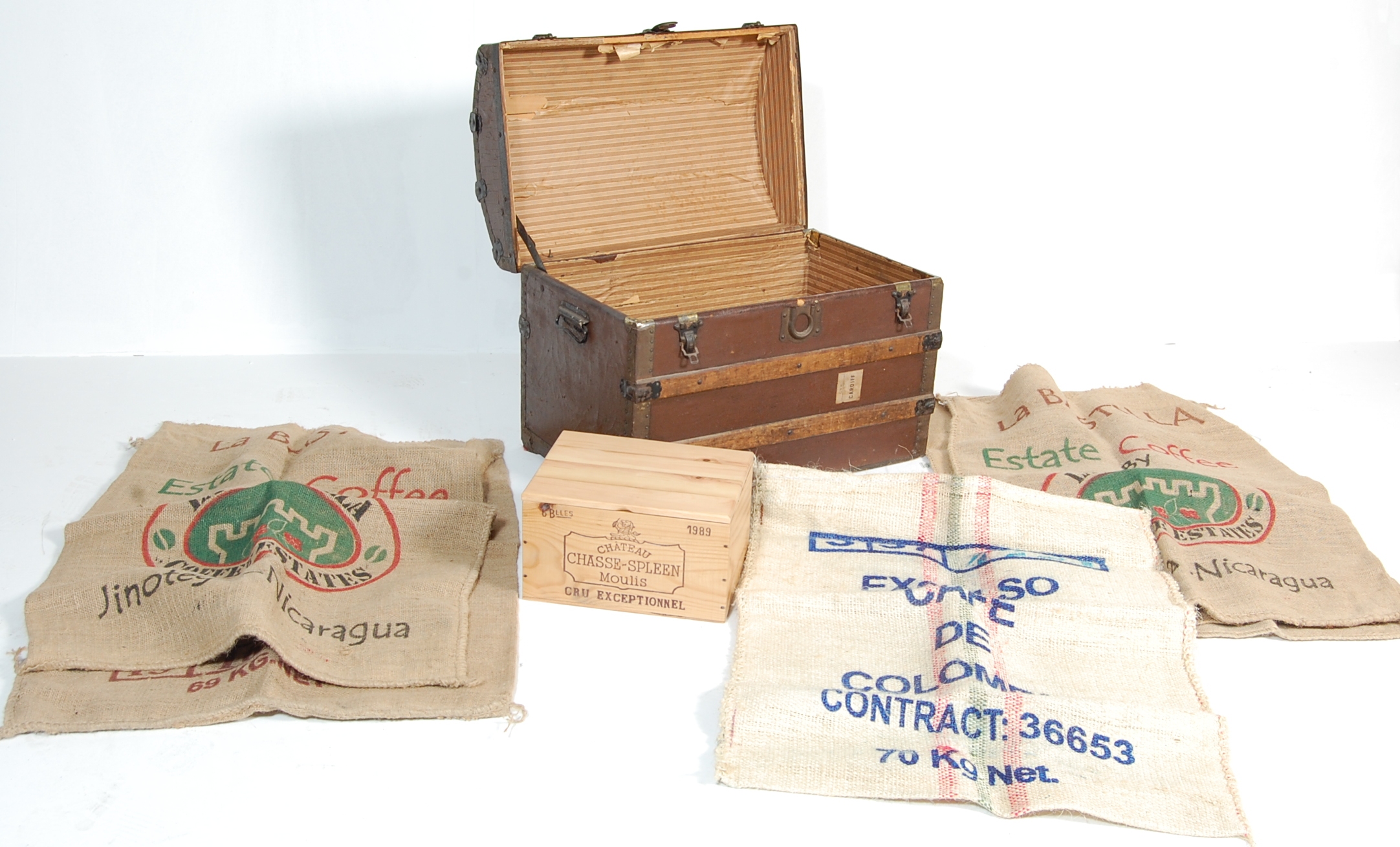 AN EARLY 20TH CENTURY DOME TOP CANVAS TRUNK / SHIPPING TRUNKS TOGETHER WITH FABRIC COFFEE SACKS