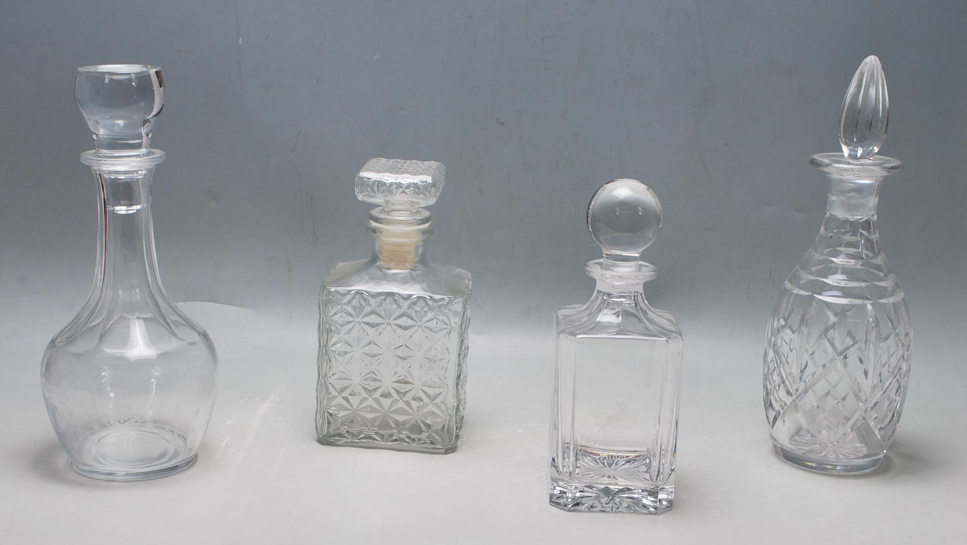 A COLELCTION OF VINTAGE LATE 20TH CENTURY CUT GLASS CRYTAL DECANTERS