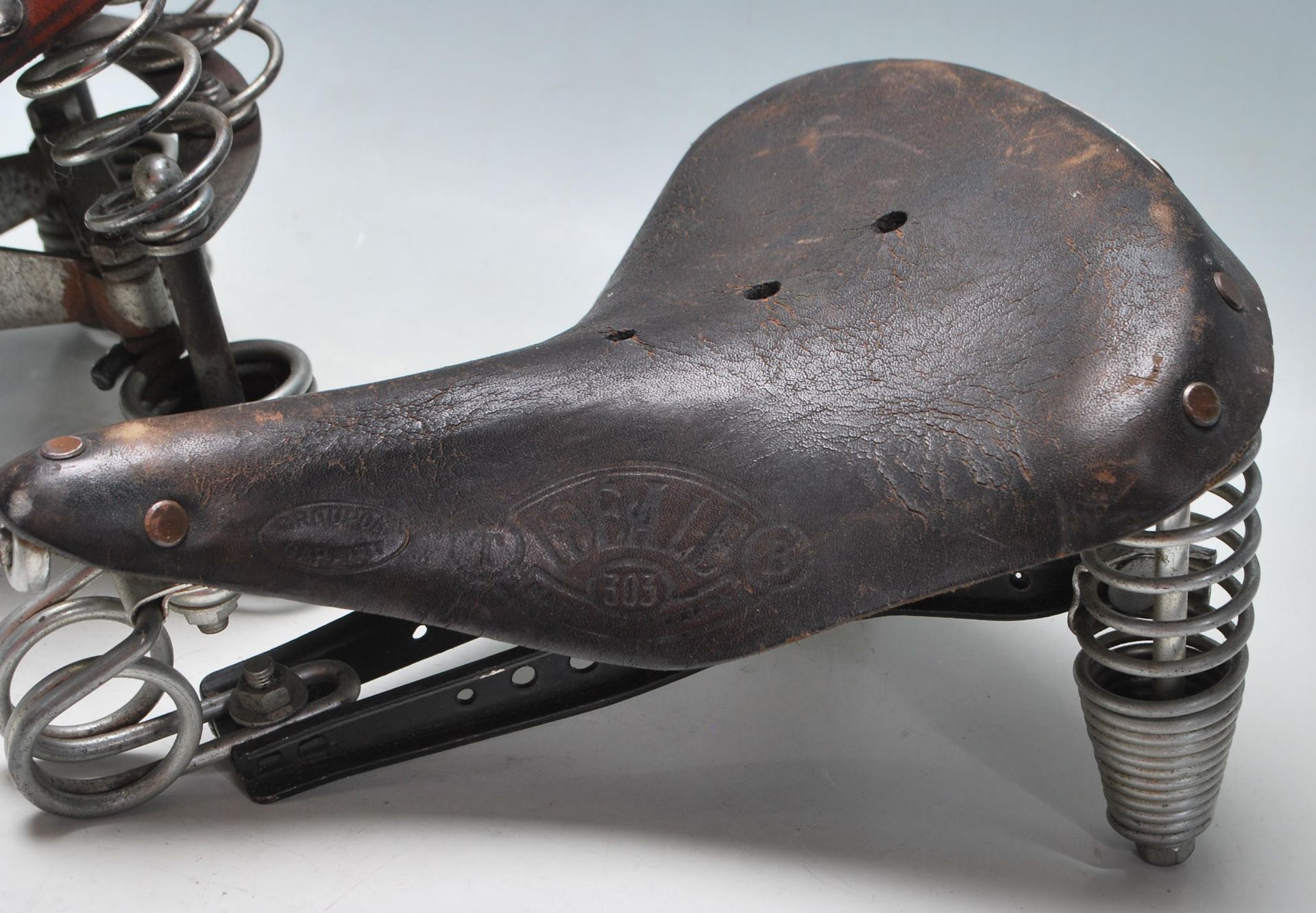 COLLECTION OF THREE ANTIQUE LEATHER SADDLES - Image 5 of 6