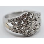 18CT WHITE GOLD AND DIAMOND FLORAL CLUSTER RING