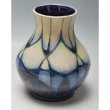 MOORCROFT VASE OF BALUSTER FORM WITH GEOMETRICAL DECORATION