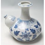 MIDDLE EASTERN BLUE AND WHITE WATER JUG