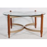 20TH CENTURY RETRO GLASS AND TEAK COFFEE TABLE WITH METAL STRETCHERS