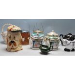 A GROUP OF VINTAGE CERAMIC PORCELAIN KITCHEN WARE - TEAPOTS - BISCUITS BARREL