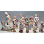 A LARGE COLLECTION OF 20TH CENTURY ANTIQUE BISQUE FIGURINES