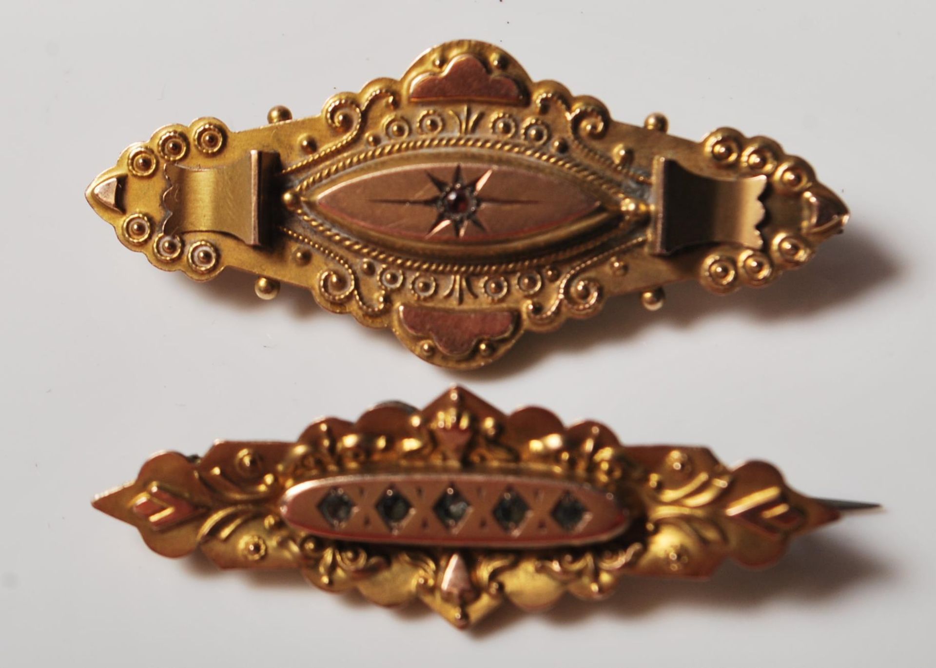 TWO VICTORIAN 9CT GOLD MOURNING BROOCHES