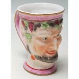 AN ANTIQUE DERBY STYLE- SPODE / PRATT SATYR MUG OF BACCHUS