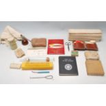 COLLECTION OF VINTAGE MILITARY AND CIVILIAN EARLY 20TH CENTURY FIRST AID ITEMS