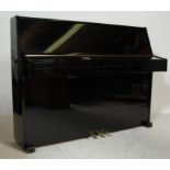 CONTEMPORARY BERGMANN IRON BOUND UPRIGHT PIANO