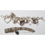 1980’S SILVER BRACELET WITH OVAL LINKS AND HEART SHAPED PADLOCK