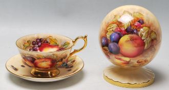 AYNSLEY FINE BONE CHINA FRUIT PATTERN CUP, SAUCER AND COMMEMORATIVE SCULPTURE