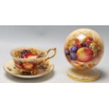 AYNSLEY FINE BONE CHINA FRUIT PATTERN CUP, SAUCER AND COMMEMORATIVE SCULPTURE