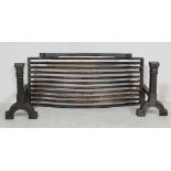 A LARGE 20TH CENTURY VICTORIAN STYLE CAST IRON FIRE GRATE & FIRE DOGS