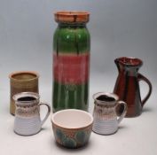 A GROUP OF SIX RETRO STUDIO ART POTTERY VASES AND JUGS