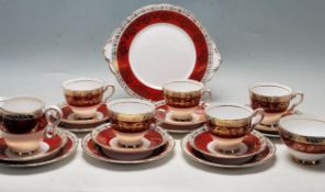 ROYAL STAFFORD BONE CHINA TEA SET WITH RED AND GILT FOLIATE DECORATION