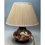 MOORCROFT TABLE LAMP OF BALUSTER FORM WITH ANNA LILY BASE PATTERN