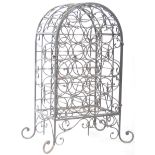 19TH CENTURY WROUGHT IRON WINE RACK OF ARCHED FORM