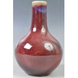 19TH CENTURY CHINESE FLAMBE GLAZE BOTTLE VASE