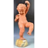 DECORATIVE ANTIQUE STYLE FIGURINE OF A DANCING CHERUB