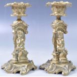 PAIR OF 9TH CENTURY ROCOCO INFLUENCE CHERUB CANDLESTICKS