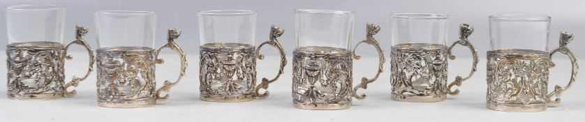 SET OF SIX CONTINENTAL SILVER AND GLASS LICQUER CUPS