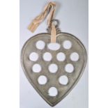 EARLY 19TH PEWTER HEART HANGING SPOON RACK