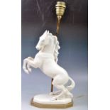 EARLY 20TH CENTURY BLANC DE CHINE HORSE TABLE LAMP