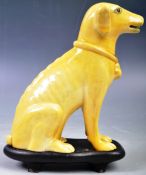 EARLY 20TH CENTURY CHINESE POTTERY FAMILLE JAUNE DOG FIGURE