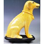 EARLY 20TH CENTURY CHINESE POTTERY FAMILLE JAUNE DOG FIGURE