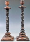 STUNNING PAIR OF 19TH CENTURY CARVED CANDLESTICKS