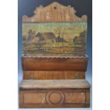 EARLY 20TH CENTURY DUTCH PINE HANGING CANDLE BOX HAVING A PAINTED SCENE