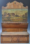 EARLY 20TH CENTURY DUTCH PINE HANGING CANDLE BOX HAVING A PAINTED SCENE