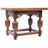 ARTS AND CRAFTS OAK DRAW LEAF DINING TABLE RAISED ON CUP & COVER SUPPORTS