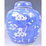 18TH CENTURY KANGXI PORCELAIN PRUNUS PATTERN GINGER JAR AND COVER