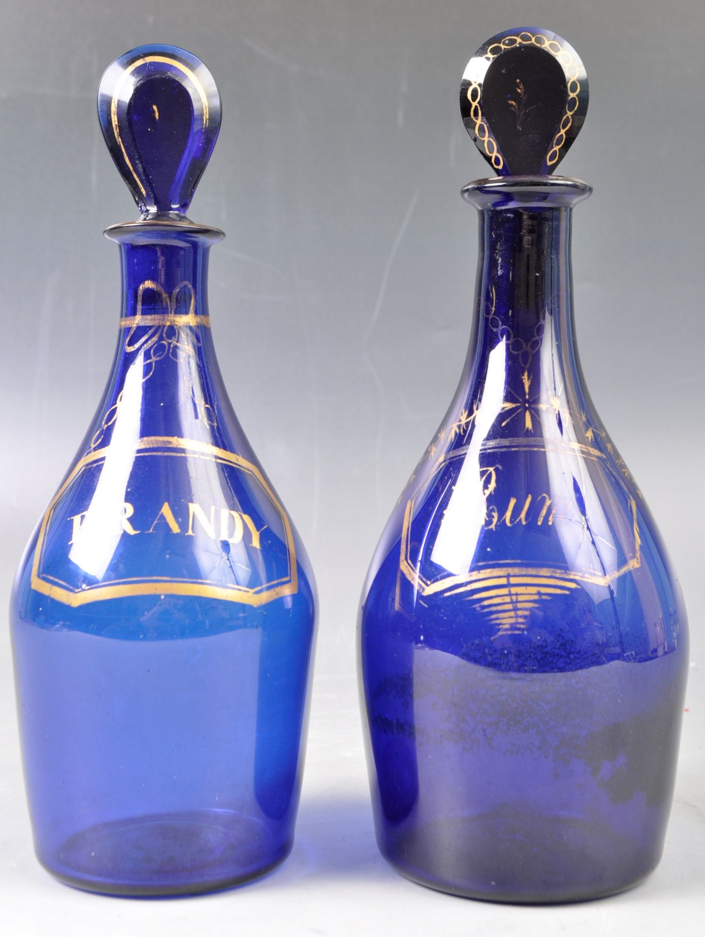 PAIR OF 19TH CENTURY GEORGIAN BRISTOL BLUE DECANTERS