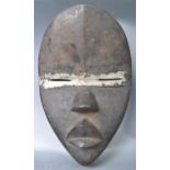 AFRICAN TRIBAL ANTIQUE IVORY COAST DAN MASK WITH METAL SLITS