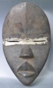 AFRICAN TRIBAL ANTIQUE IVORY COAST DAN MASK WITH METAL SLITS