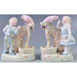 ANTIQUE PAIR OF BISCUIT PORCELAIN MATCH STRIKERS