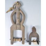 TWO 19TH CENTURY AFRICAN HAND CARVED PULLEYS