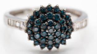 A Hallmarked 9ct gold blue and white diamond cluster ring
