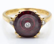 A Glenn Lehrer 9ct Gold Garnet & Diamond Torus Ring