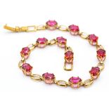 9ct Gold & Pinkish Red Topaz Bracelet